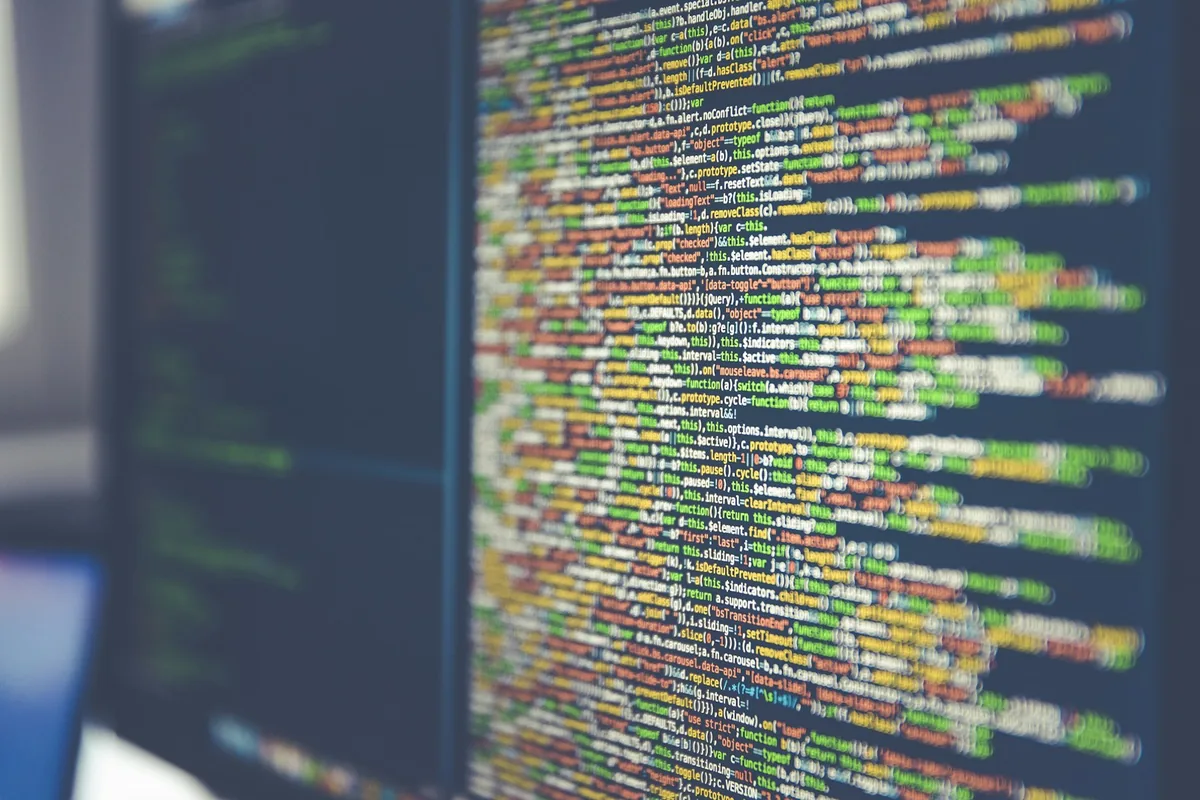Colourful software code displayed on a computer monitor
